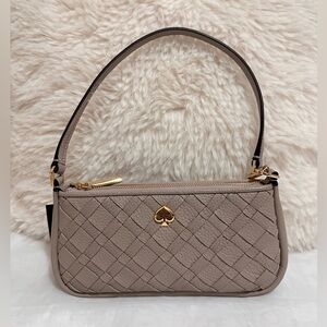 Kate Spade Kayla woven leather convertible wristlet